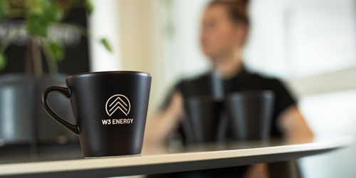 Cup with W3 Energy logo on
